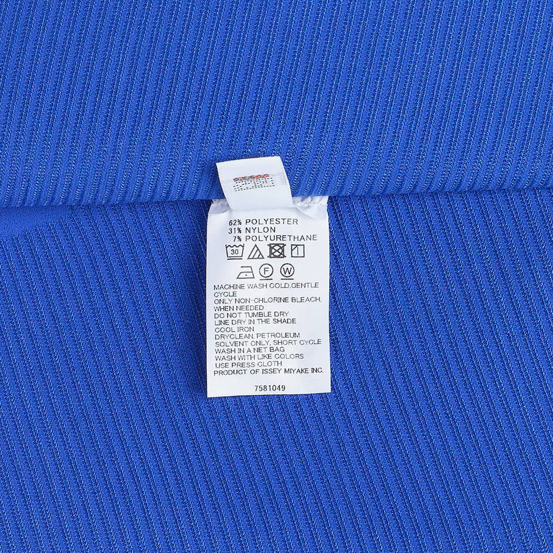 Pleats Please Issey Miyake A-POC Sea Glass Tunic in black with fine pleated texture and asymmetric hemline