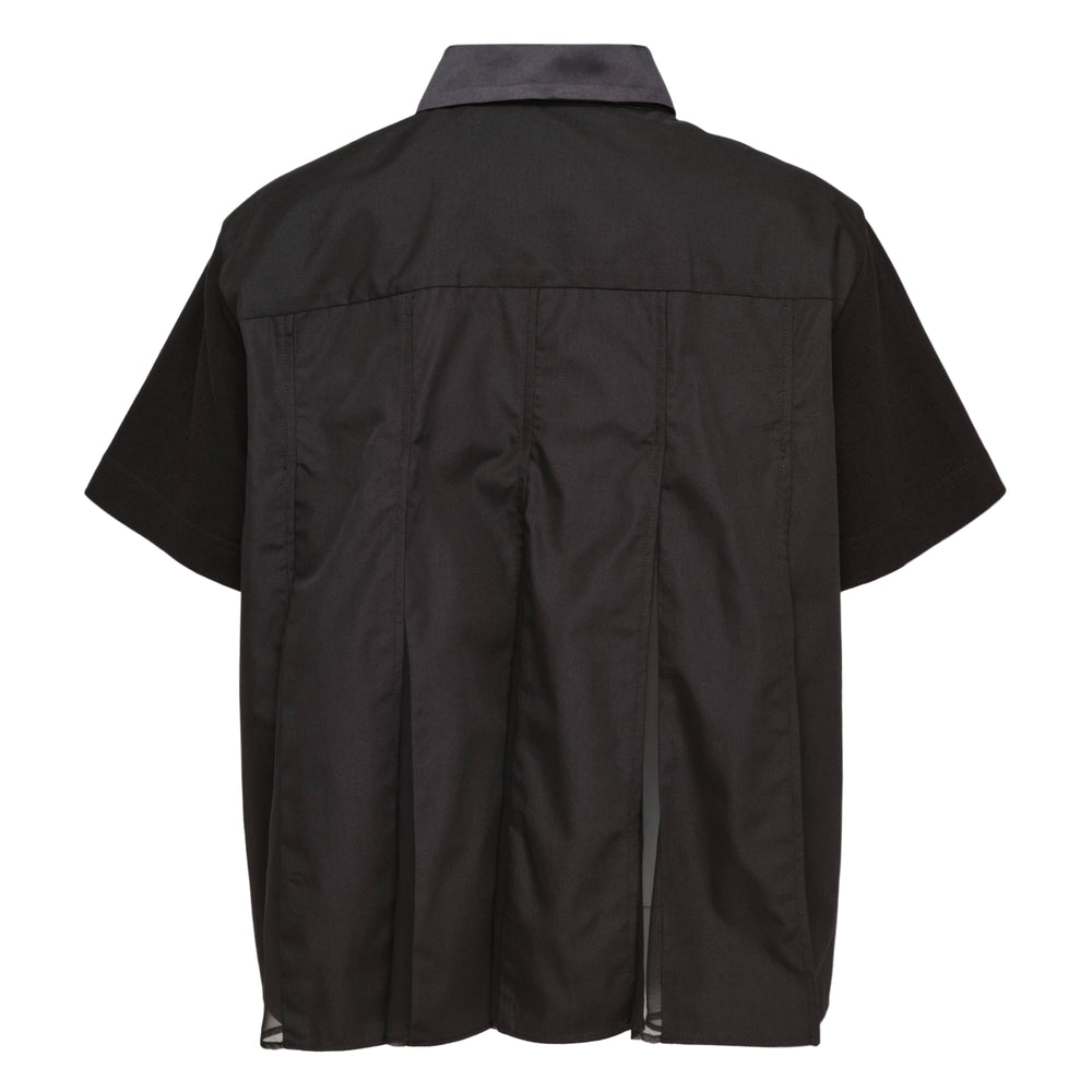 sacai Poplin Polo Shirt in black with a satin-trimmed point collar, concealed button placket, and short sleeves in a boxy cropped silhouette