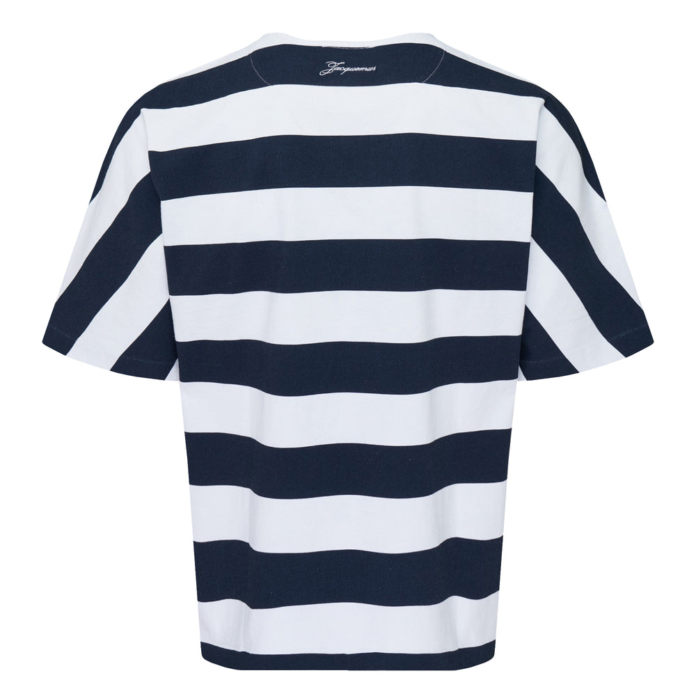 Jacquemus Marinière short sleeve oversized tee in bold navy and white horizontal stripes with a two-button Henley placket, front view on white background.