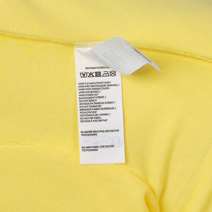 Jacquemus Mistral Short Sleeve Jersey Dress in bright lemon yellow with wide boat neckline and relaxed midi-length silhouette