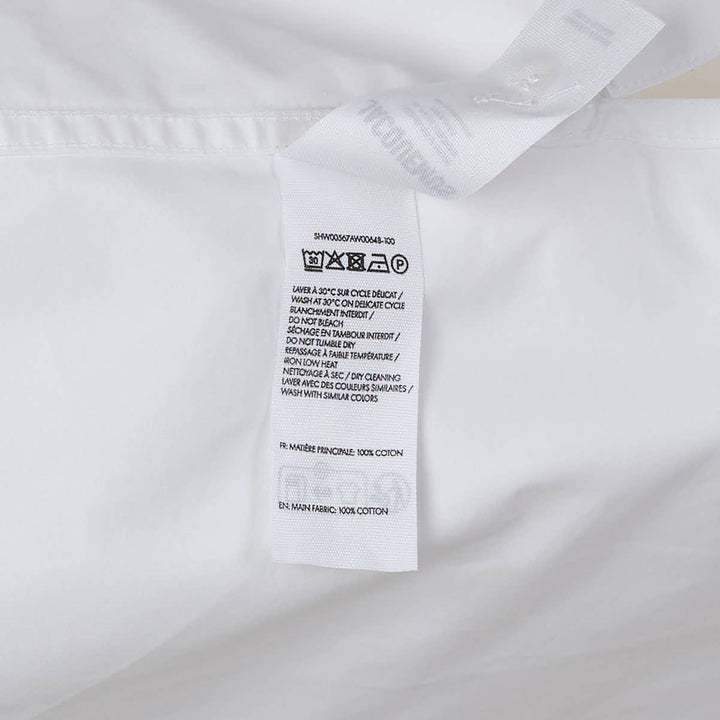 Jacquemus La Chemise Marin white woven short-sleeve camp collar shirt with gold buttons and embroidered logo chest pocket from the Plage collection