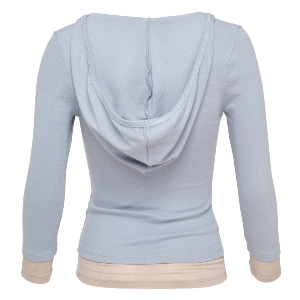 Glowny Layered Contrast Hoodie in pale blue with beige contrast trim at the V-neckline, cuffs, and hem band — front view on white background