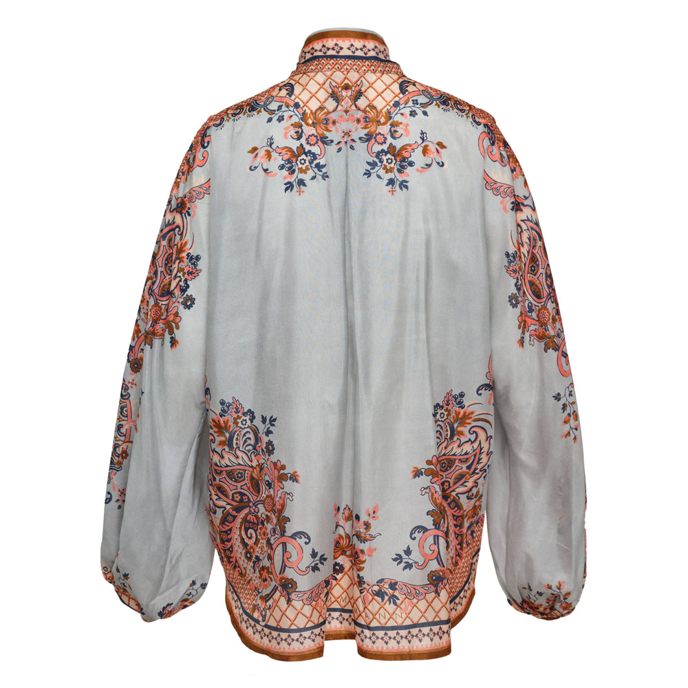 Zimmermann Aster Tie Neck Blouse in grey with coral and navy paisley floral print, pussy-bow tie collar and voluminous balloon sleeves