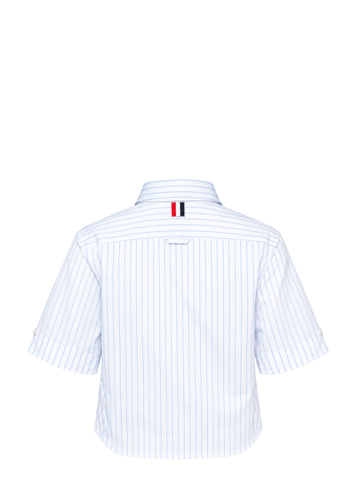 Thom Browne cropped short sleeve shirt in white with blue vertical pinstripes, button-down collar, chest pocket and woven logo label at the hem - view 2