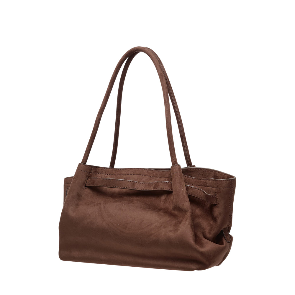 JW PEI Hana Wide Faux Suede Tote in chocolate brown, featuring tubular shoulder straps, a gathered slouchy body, and a gold-tone twist-lock hardware detail on the centre belt panel