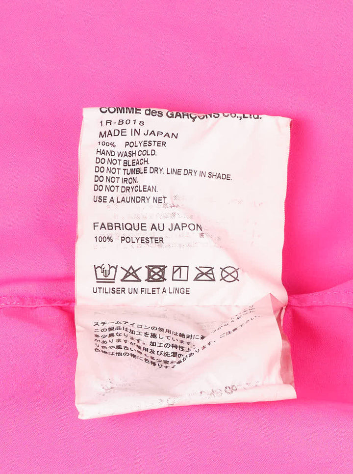 Comme des Garçons Black oversized hooded poplin shirt in bright fuchsia pink with asymmetric button placket and chest patch pocket - view 3