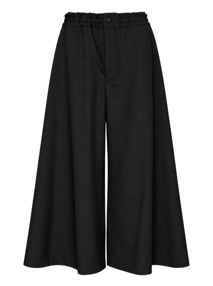 Comme des Garçons Black wide-leg cropped culottes in a polyester-wool glen check with a gathered elasticated waistband and button closure