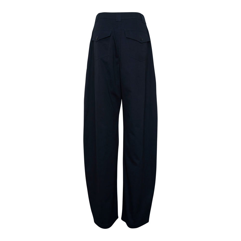 Ulla Johnson Laure Barrel Leg Trousers in camel cotton, featuring a high-rise waist, sculptural barrel leg silhouette, and gold-tone flap pocket hardware