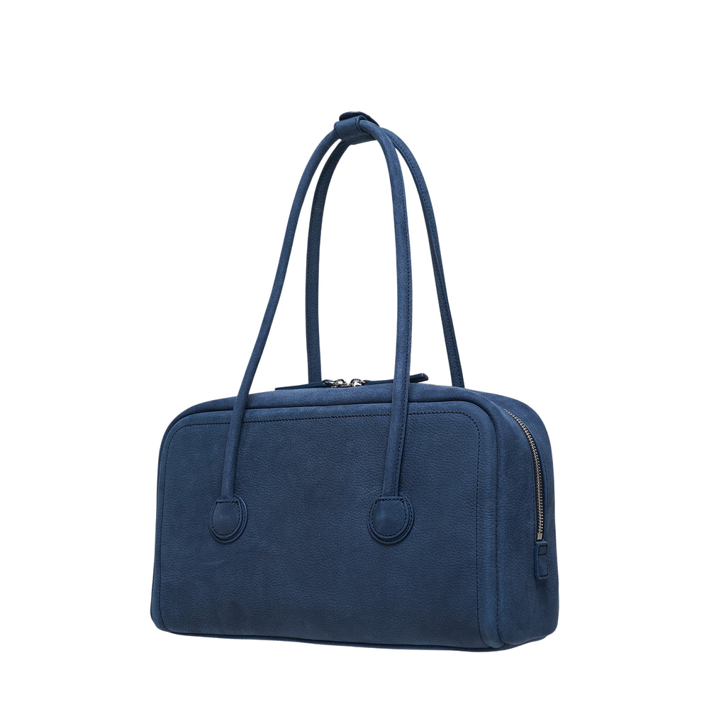Marge Sherwood Soft Boston Small shoulder bag in navy nubuck leather with dual top handles, circular anchor rings, and top zip closure, shown from the front