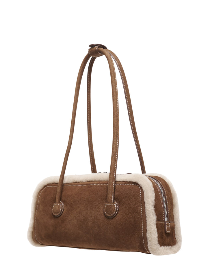 Marge Sherwood Soft Boston EW shoulder bag in pebbled tan leather with cream shearling trim, dual straps, white contrast stitching, and embossed logo on front - view 2