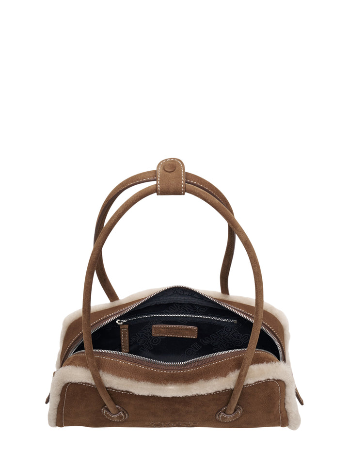 Marge Sherwood Soft Boston EW shoulder bag in pebbled tan leather with cream shearling trim, dual straps, white contrast stitching, and embossed logo on front - view 3