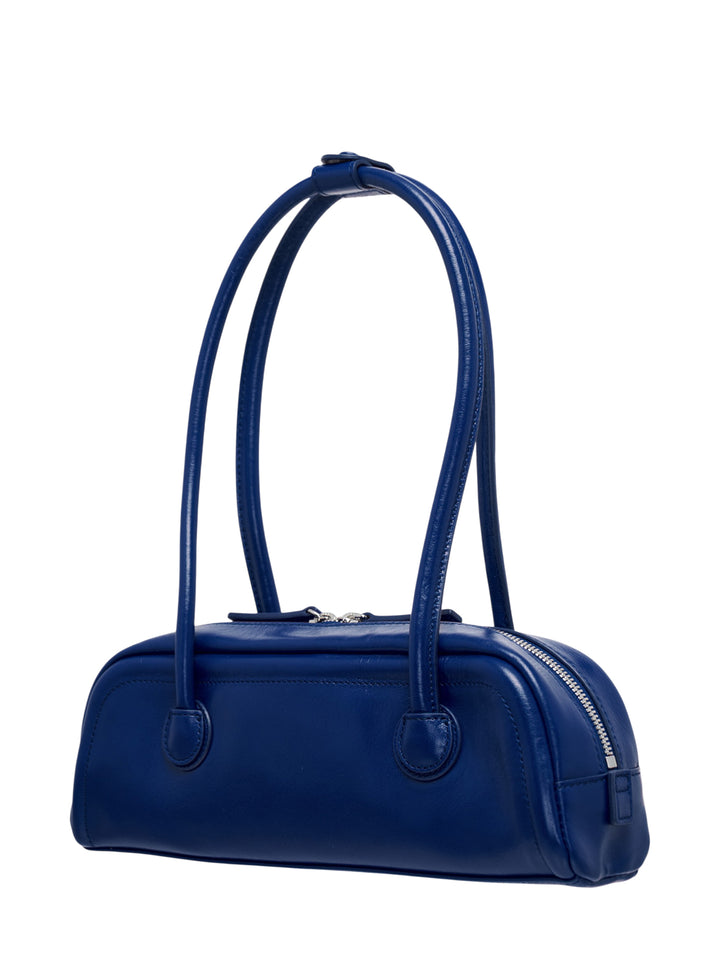 Marge Sherwood Soft Boston EW Mini shoulder bag in navy blue leather with dual top handles, zip closure, and embossed logo on a white background - view 2