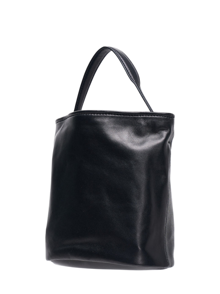 Marge Sherwood Wired Bucket Bag in black pebbled leather with silver-tone chain drops and sculptural charm pendant, shown on a white background - view 2