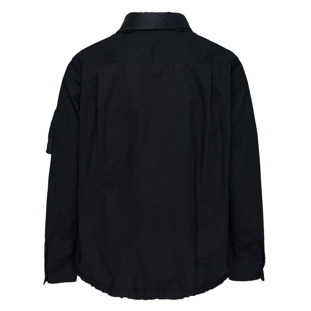 sacai Cotton Nylon Oxford Blouson in black, featuring a dual zip and snap-button front placket, flap hip pockets, a utility sleeve pocket, and an elasticated ribbed hem
