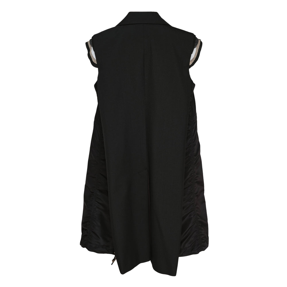 sacai Suiting Gilet Vest in black, featuring a notched lapel, deconstructed exposed shoulders, dual flap pockets, drawstring side toggles, and a gathered elasticated hem