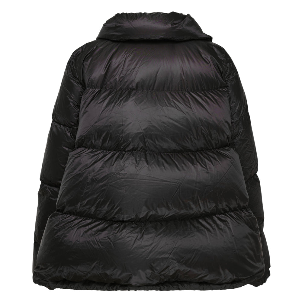 sacai oversized black quilted down puffer jacket with high funnel neck, front zip closure, and elasticated cuffs with eyelet hardware