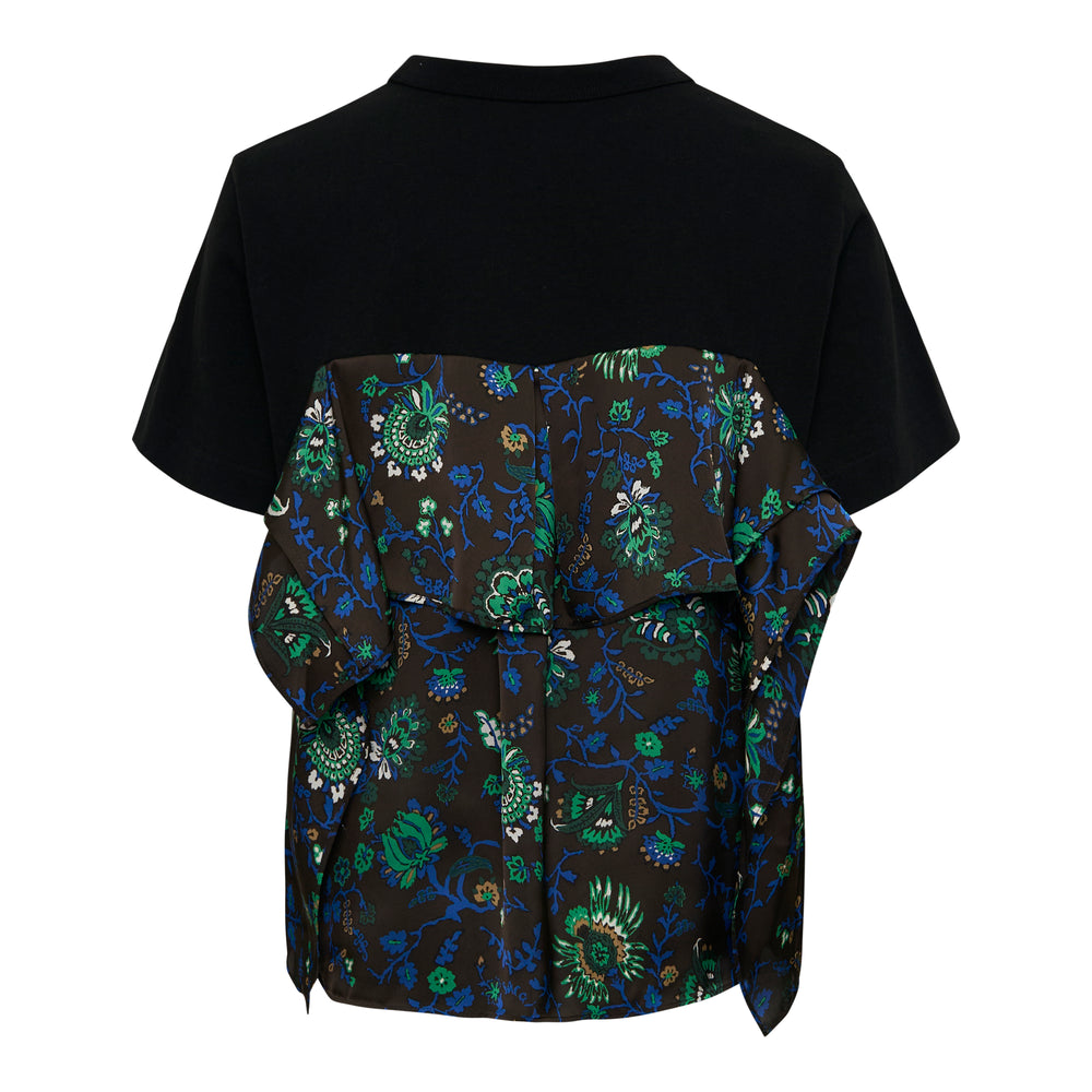 sacai Floral Print Cotton Jersey Tee in black with a tiered floral-print woven ruffle overlay across the chest, featuring a crew neckline and short sleeves