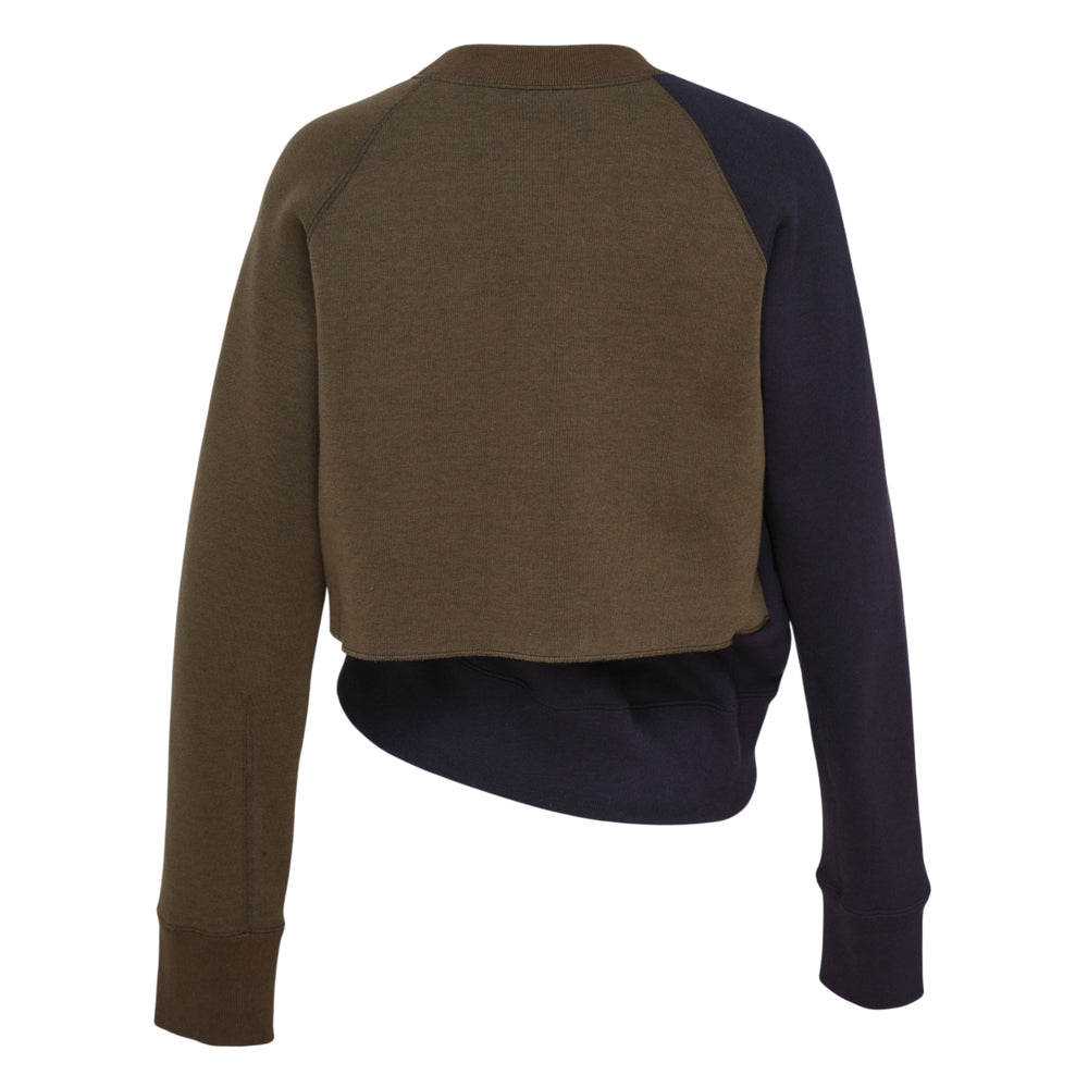 sacai Sponge Sweat Pullover in olive and navy colour-block, featuring a cropped overlay with asymmetric under-layer and contrast long sleeves with ribbed cuffs