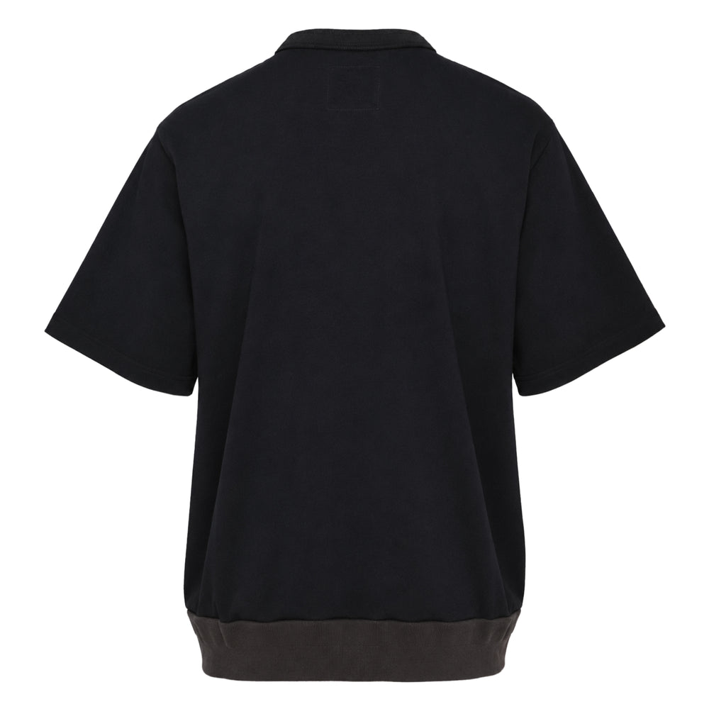 sacai Cotton Jersey T-Shirt in black with contrast leather-look ribbed hem, snap-tab hardware accents on the chest, and a single patch pocket