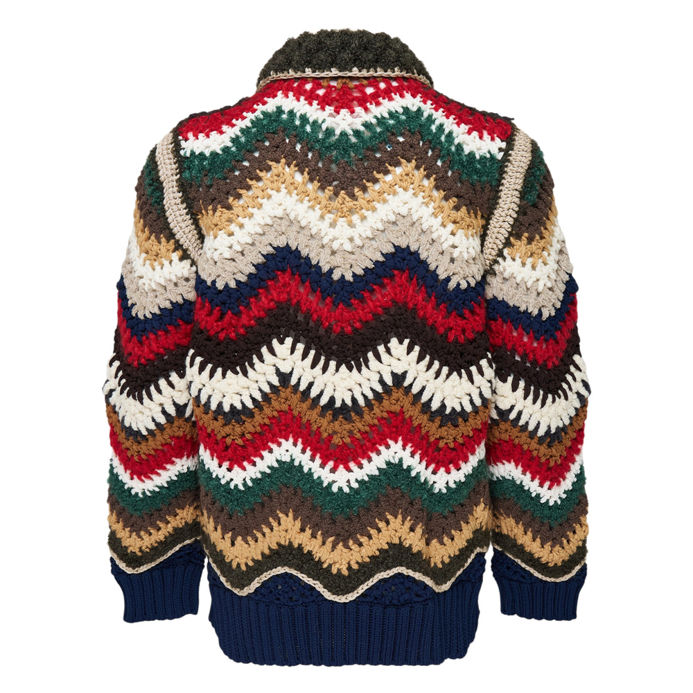 sacai Mix Crochet Knit Blouson in multicolour chevron ripple-stitch crochet with dark olive sherpa collar, full silver zip, and navy ribbed cuffs and hem