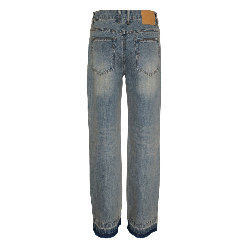 We11done light blue faded wash straight-leg jeans with released raw indigo hem detail, front view