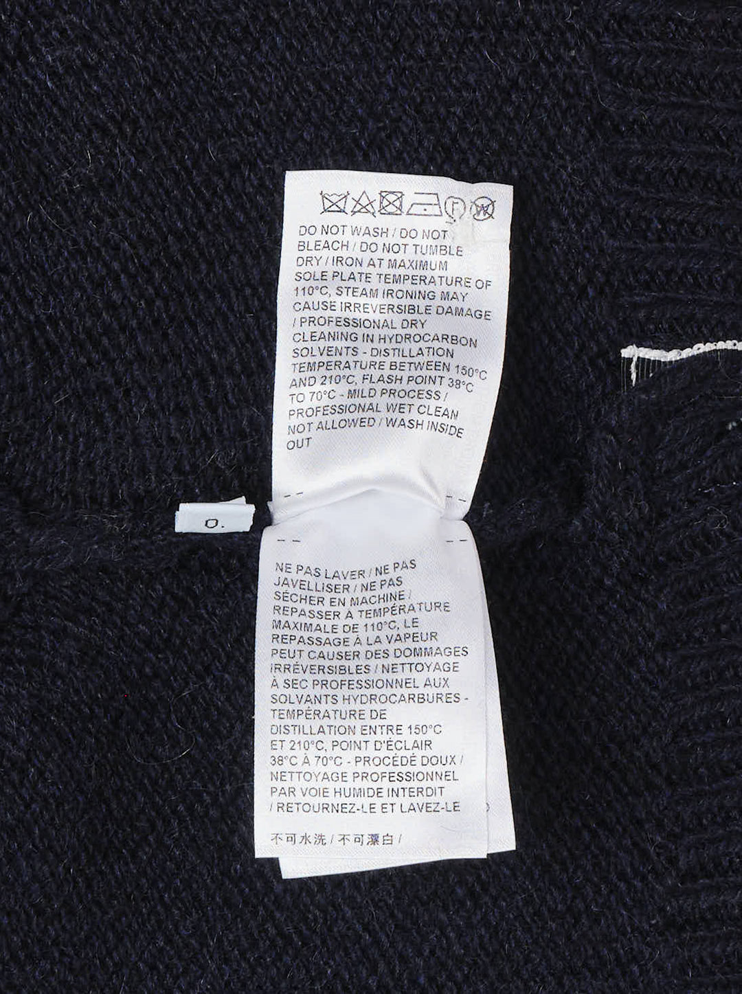 Thom Browne navy chunky-knit V-neck vest with red, white, and blue intarsia stripes at the neckline and hem and pearl buttons at the hem - view 4