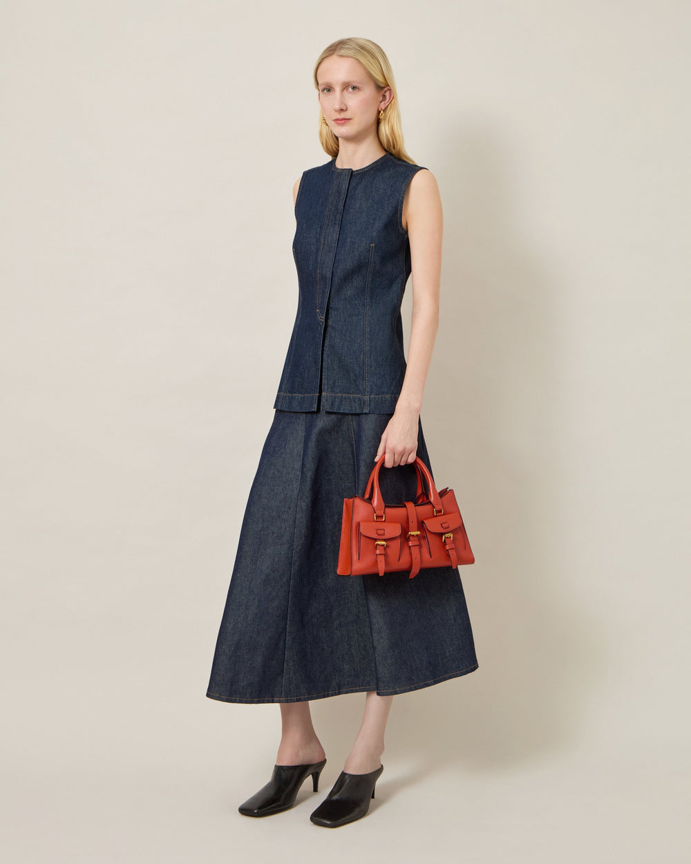 Mulberry Small Roxanne Satchel in terracotta pebbled leather with dual buckle front pockets, rolled top handles, and removable crossbody strap with antique gold-tone hardware