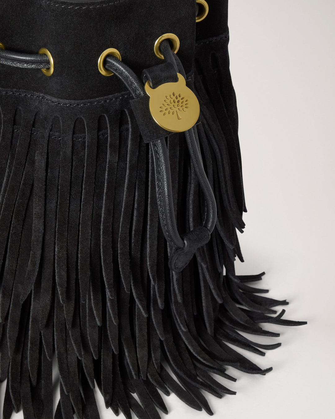 Mulberry mini black suede bucket bag with tiered fringe, gold-tone eyelets, drawstring closure with tree emblem toggle and adjustable crossbody strap - view 4