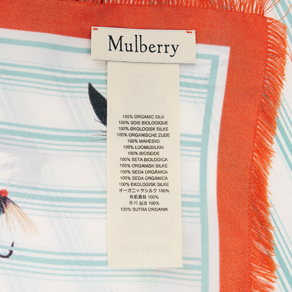 Mulberry Feather Lure Square Scarf with fly fishing lure print on teal stripe ground and orange fringe border, laid flat