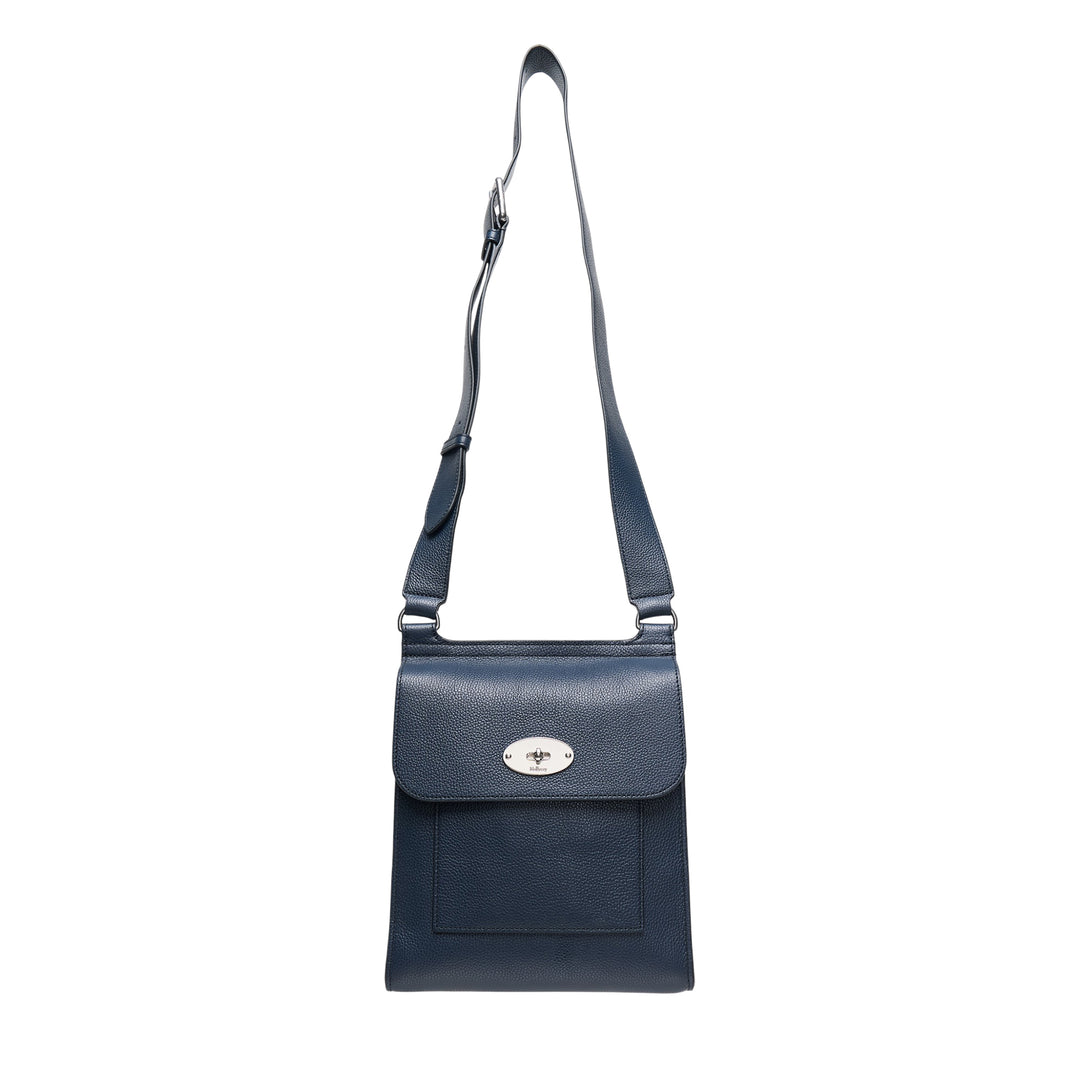 Mulberry Antony Medium Crossbody Bag in navy pebbled leather with silver-tone postman's lock closure and adjustable shoulder strap, photographed on a white background