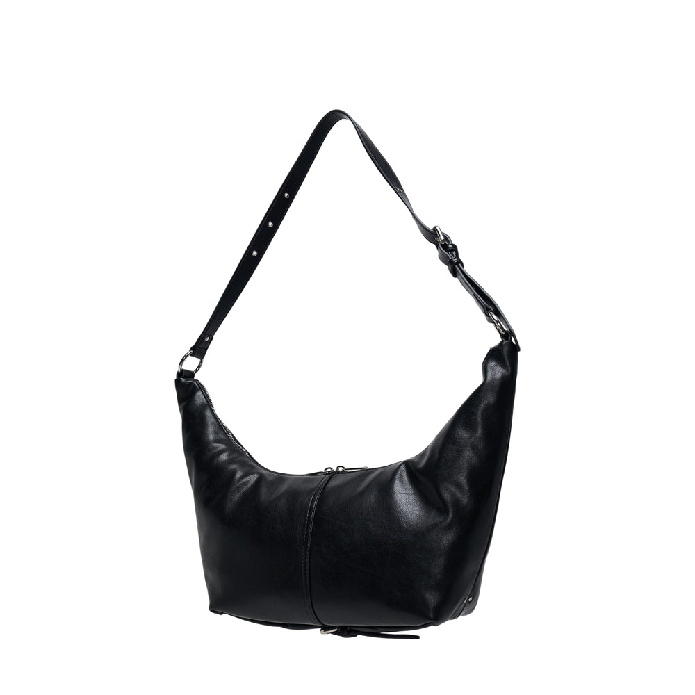 Stand Oil Tickle Bag in black leather — crescent-shaped shoulder bag with zip closure, adjustable strap, and tonal logo detail, photographed on a white background
