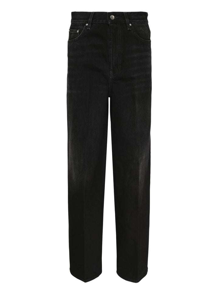 Totême Wide Leg Jeans in washed black denim with a high-rise waistband, five-pocket design, and relaxed wide-leg silhouette