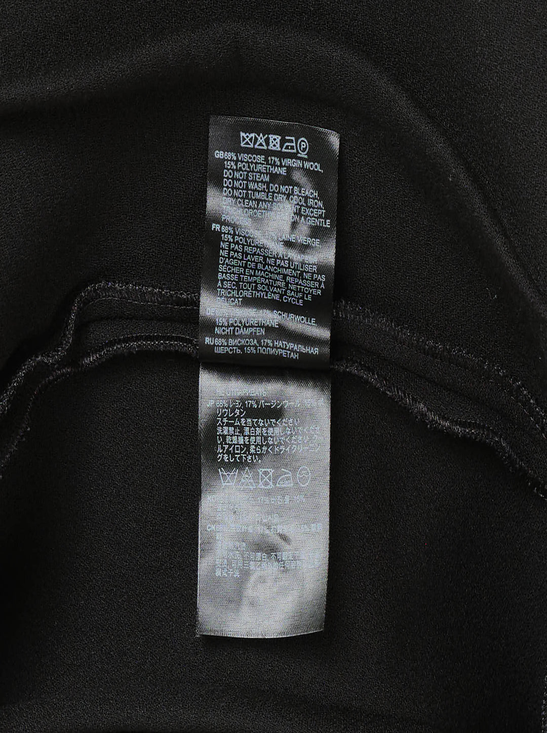 Totême Sculptural Short Dress in black — A-line silhouette with structured vertical seaming, short sleeves with frayed trim, and concealed back zip closure - view 3