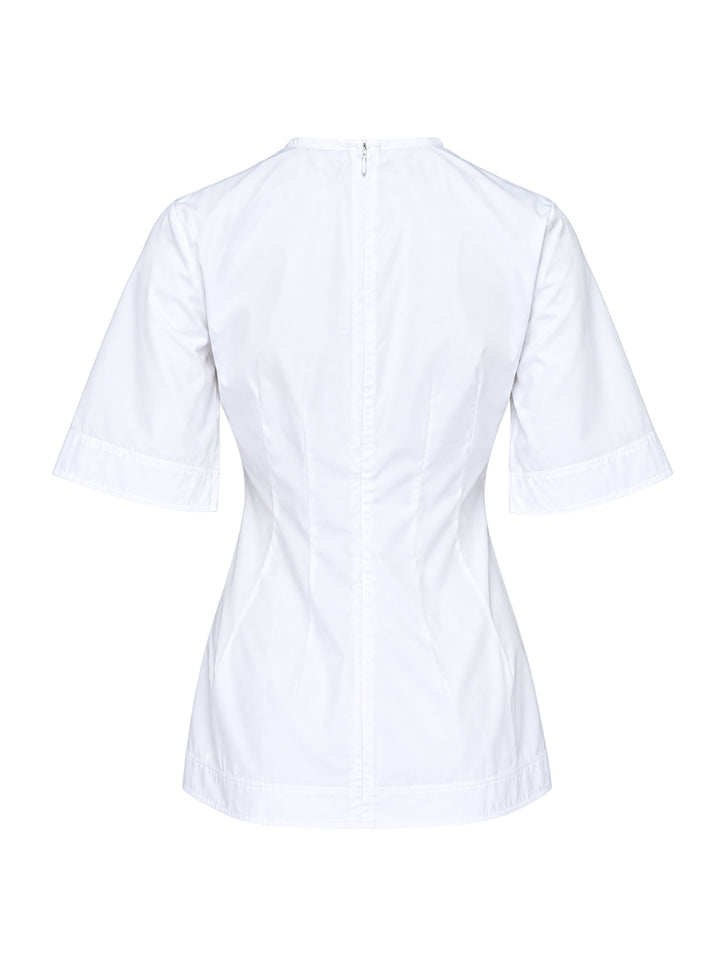 Toteme Sculptural Cotton Top in white, featuring a fitted seamed bodice, round neckline, and short fluted sleeves with a folded hem detail, shown from the front against a white background - view 2