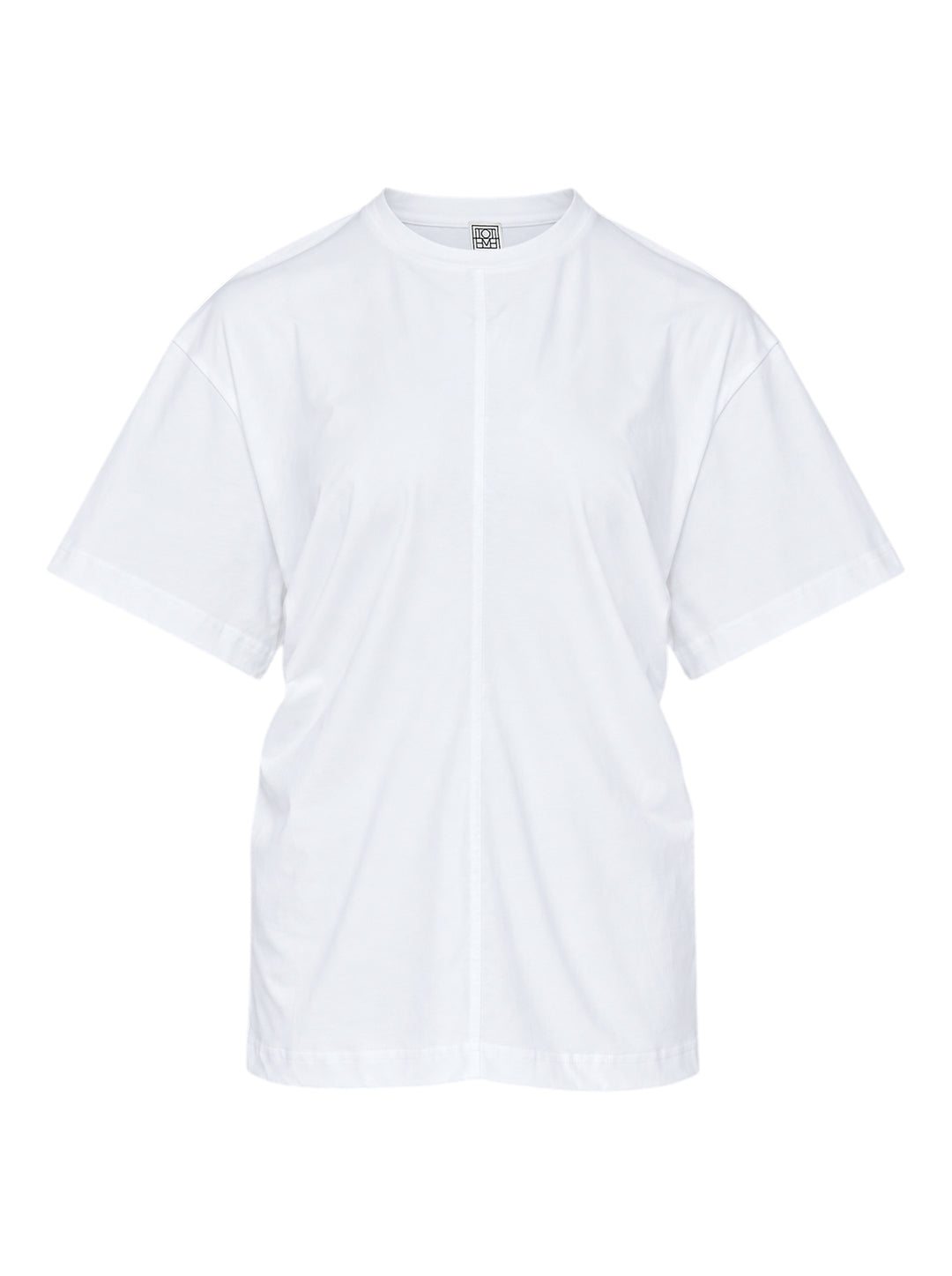 Totême Slouch Waist Jersey Top in white, featuring an oversized dropped-shoulder silhouette, centre-front seam, crew neckline, and short sleeves with folded cuffs, photographed flat on a white background