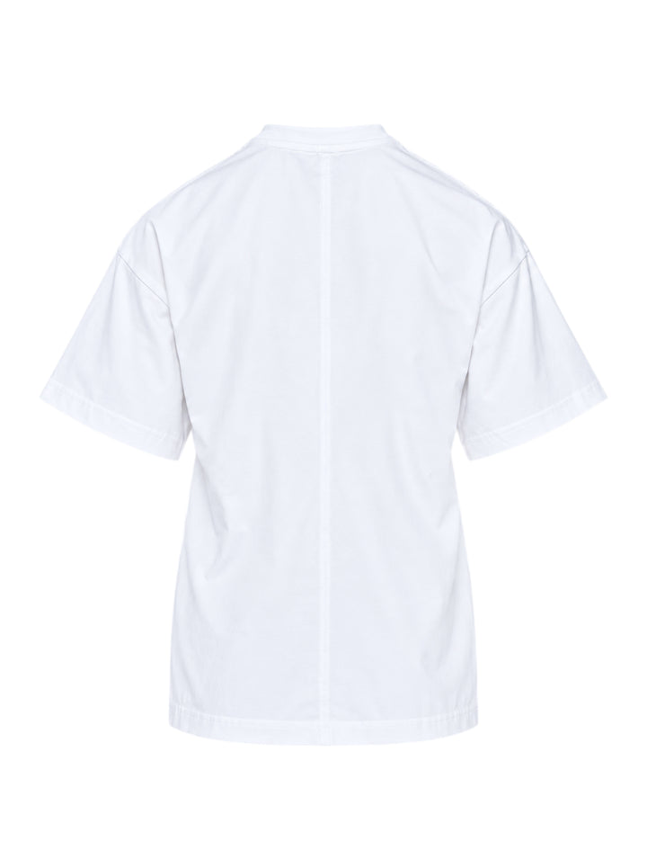 Totême Slouch Waist Jersey Top in white, featuring an oversized dropped-shoulder silhouette, centre-front seam, crew neckline, and short sleeves with folded cuffs, photographed flat on a white background - view 2