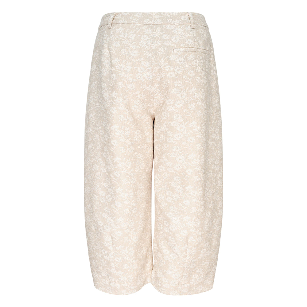 Renli Su wide leg floral trousers in cream jacquard with ruched button pocket trim and a relaxed barrel-leg silhouette