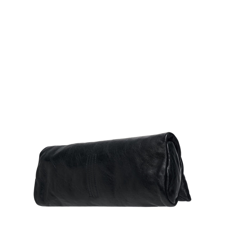 Rick Owens black tumbled lambskin leather clutch with a distressed crinkled surface and elongated pillow silhouette, shown against a white background