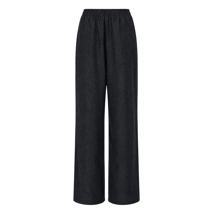 Jil Sander Light Merino wide-leg trousers in dark charcoal with elasticated waistband and clean straight-leg silhouette, front view