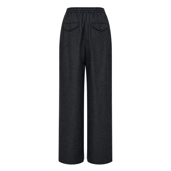 Jil Sander Light Merino wide-leg trousers in dark charcoal with elasticated waistband and clean straight-leg silhouette, front view