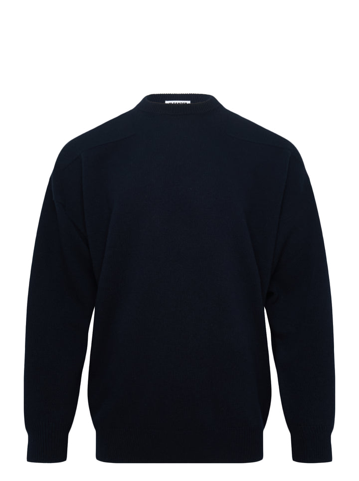 Jil Sander navy long sleeve structured knit jumper with tonal panelling and ribbed crewneck, cuffs, and hem, displayed flat on white background