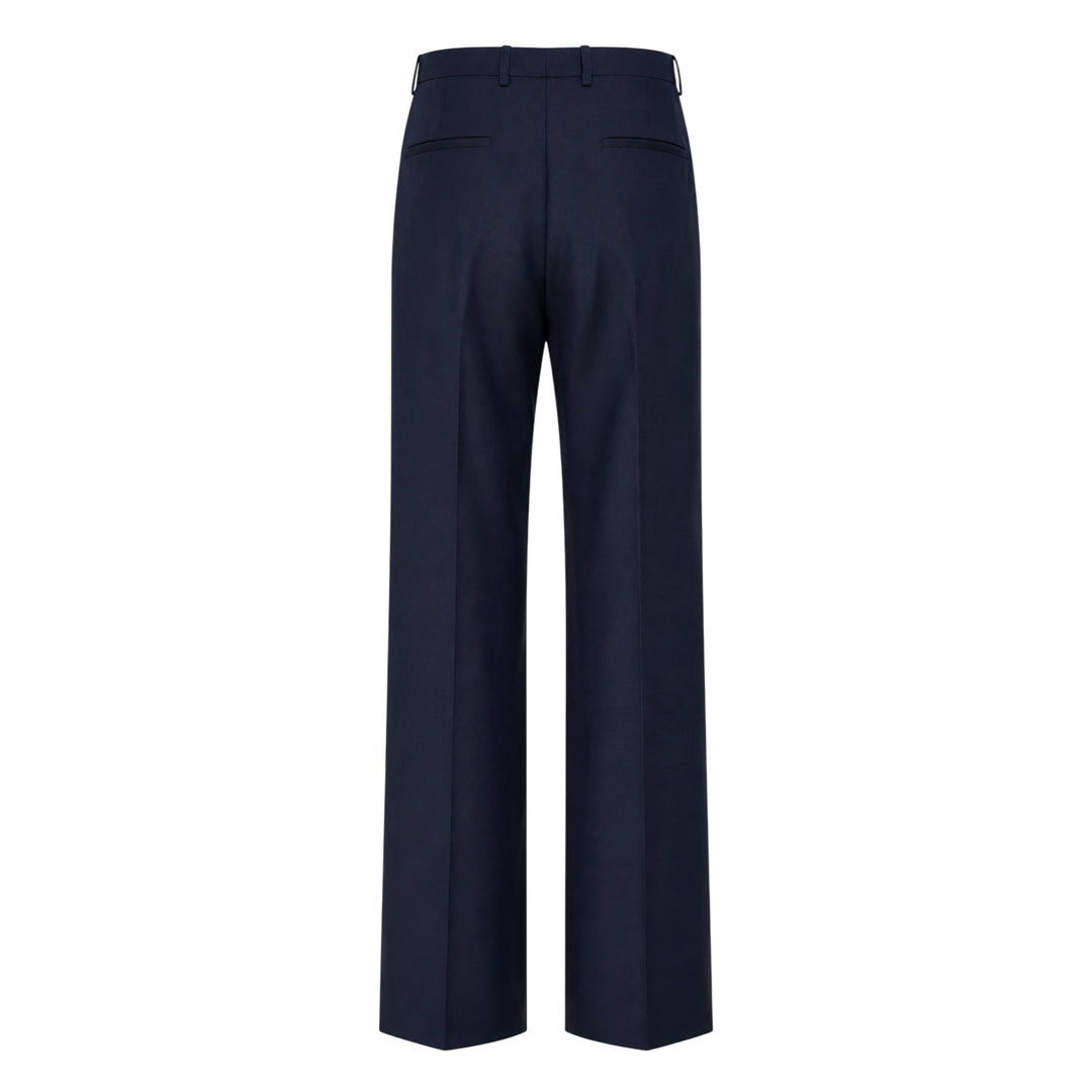 Jil Sander navy fil-a-fil wool wide-leg trousers with high-rise waist, single forward pleat, and sharp pressed front crease, displayed flat on a white background
