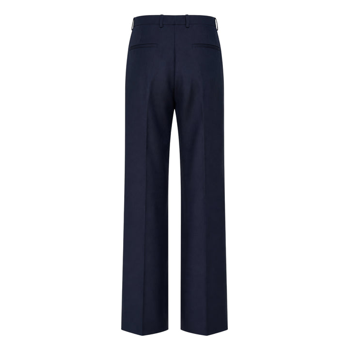 Jil Sander navy fil-a-fil wool wide-leg trousers with high-rise waist, single forward pleat, and sharp pressed front crease, displayed flat on a white background