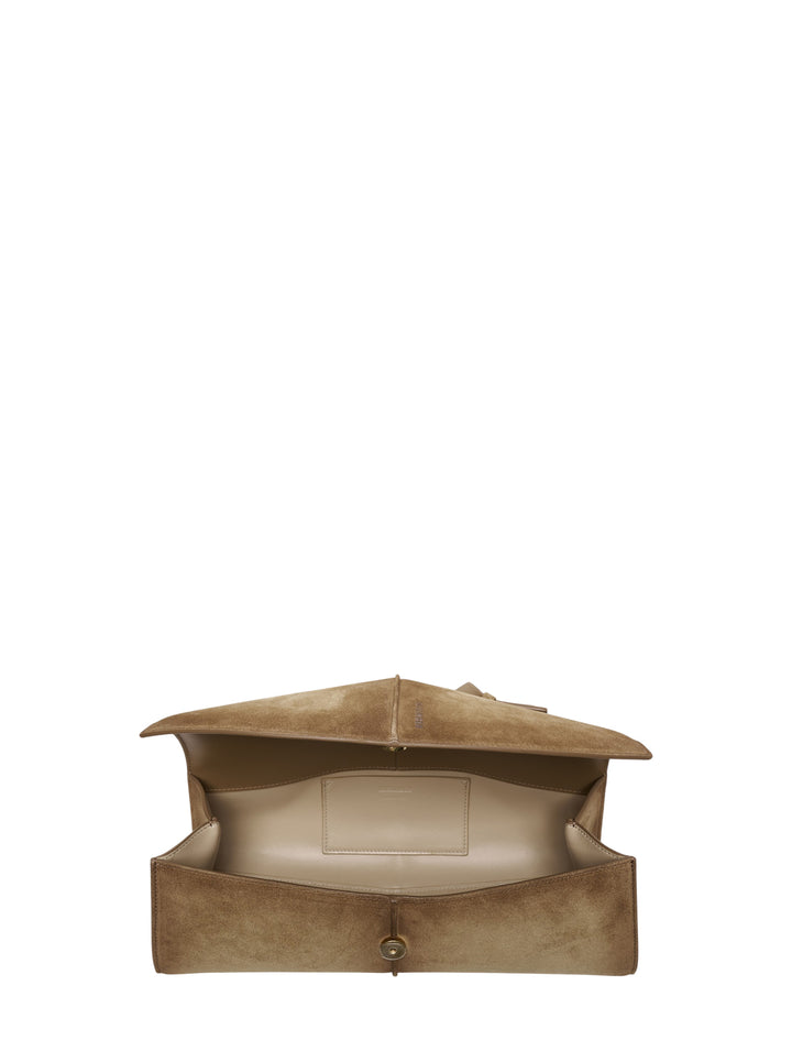 Jil Sander Linea soft suede shoulder bag in camel, featuring an angular structured silhouette, single flat top handle, fold-over flap closure, and tonal embossed logo - view 3