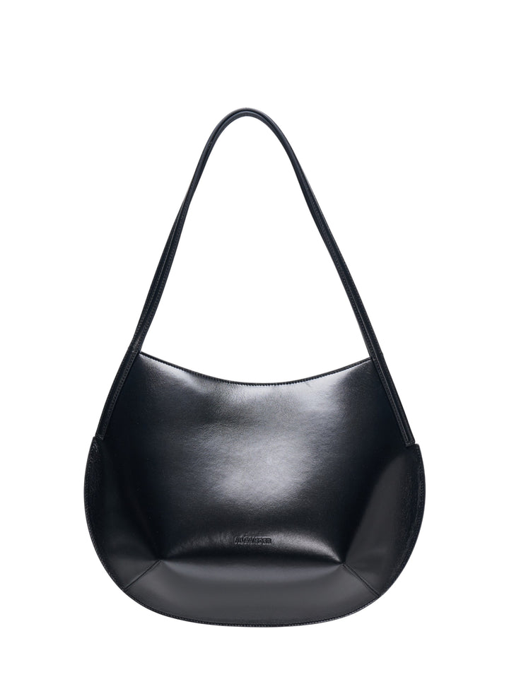 Jil Sander Kante Shoulder Bag in black shiny lambskin leather with a crescent silhouette and single flat shoulder strap, front view on white background
