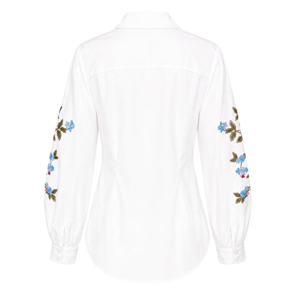 Carolina Herrera white button-down shirt with multicolour floral embroidery on voluminous puff sleeves, featuring a point collar and mother-of-pearl buttons