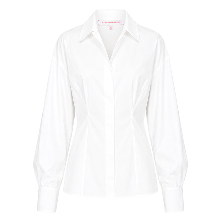 Carolina Herrera white fitted waist long sleeve collared shirt with bishop sleeves, cinched waist seaming, and concealed button front placket, displayed on a flat lay against a white background
