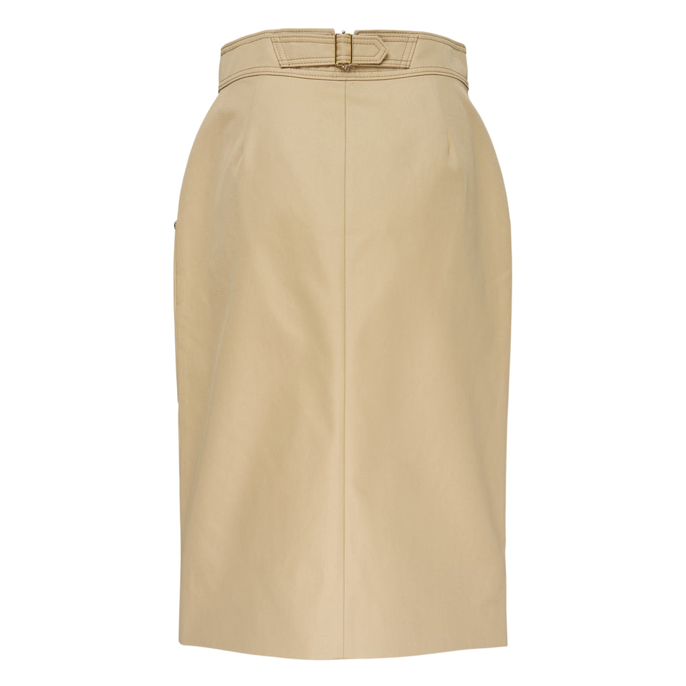 Carolina Herrera camel leather belted pencil skirt with contrast topstitching, hip patch pockets with gold-tone studs, integrated self-fabric belt with gold buckle, and a front centre slit at the hem