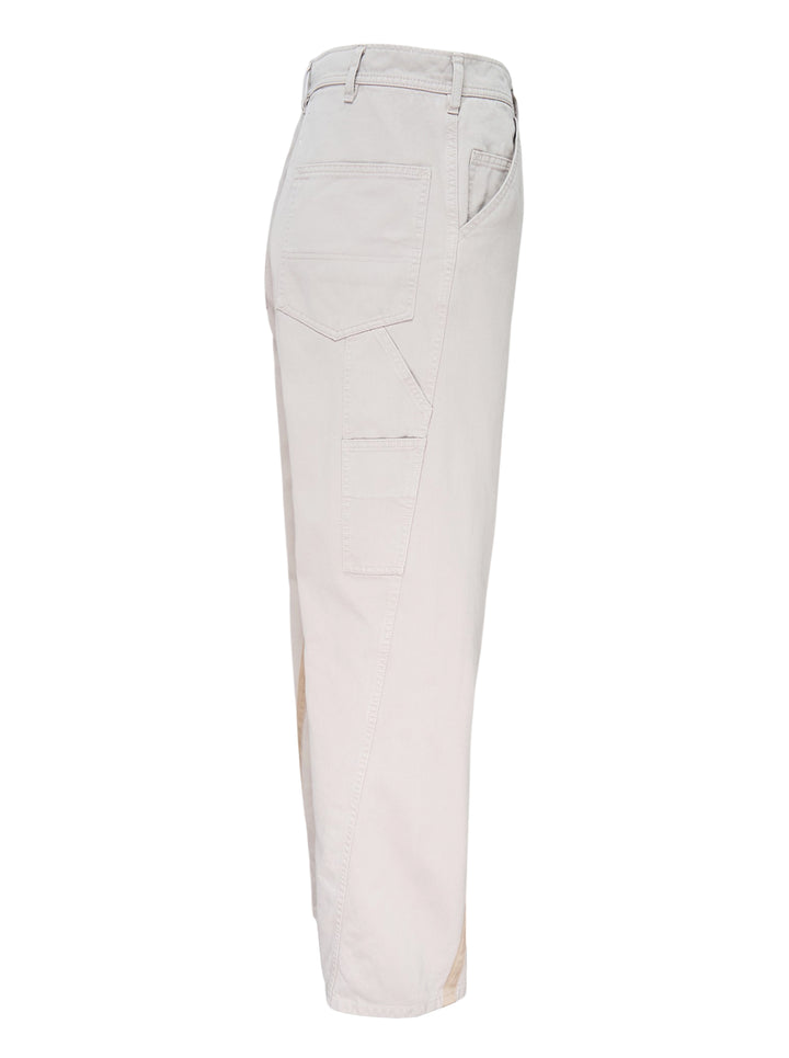 Maison Margiela stone cotton pants with a twisted seam and contrast tan tape trim, shown from the front - view 3