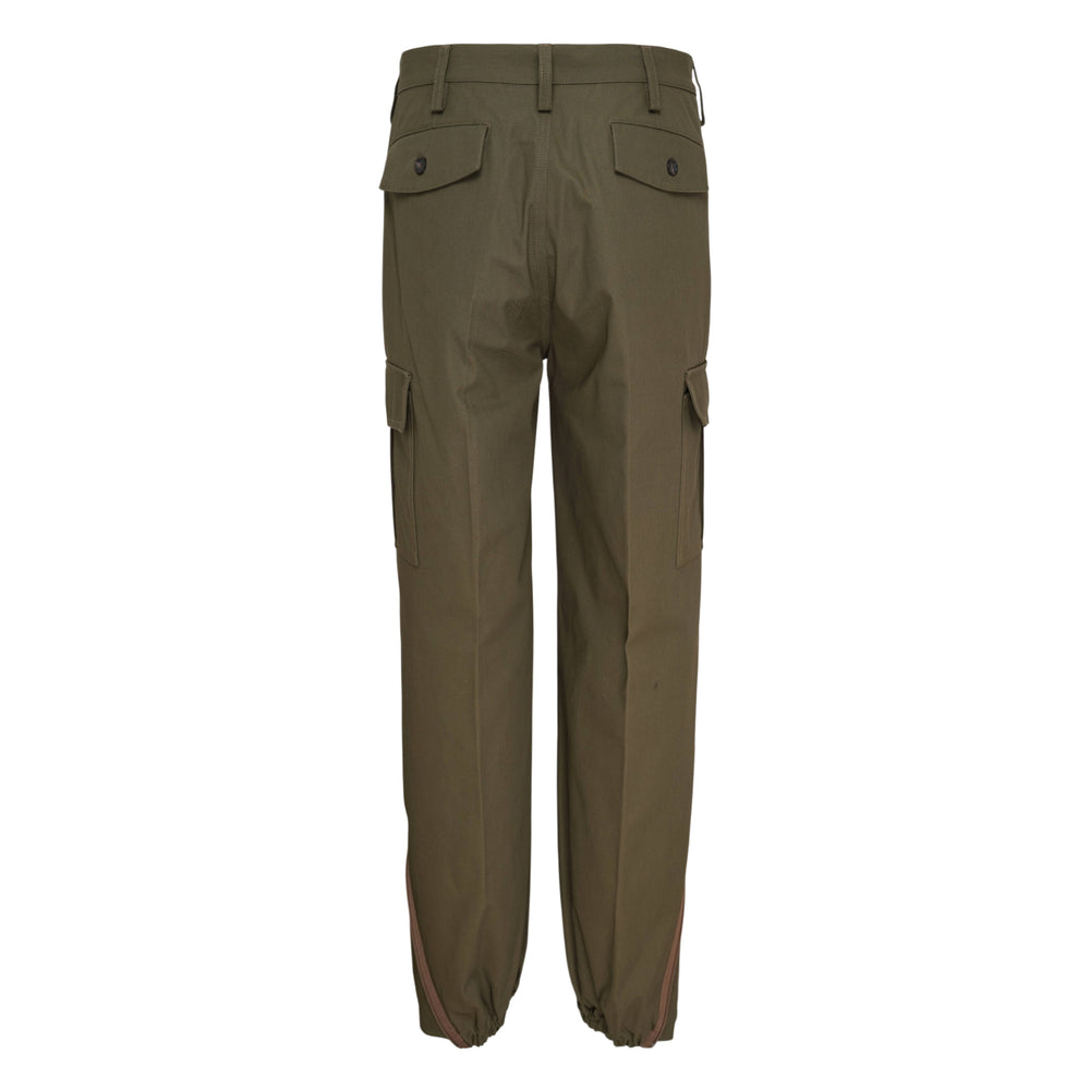Maison Margiela olive green cargo trousers with utility flap pockets, curved knee panelling, and elasticated gathered ankles with zip detail, displayed flat on white background